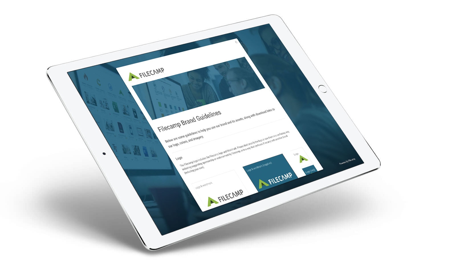 Tablet displaying Filecamp brand guidelines and interface.